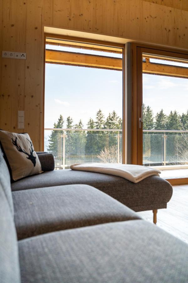 Holzhaus "Zum Schwarz'N" Apartment Aurach am Hongar Екстериор снимка