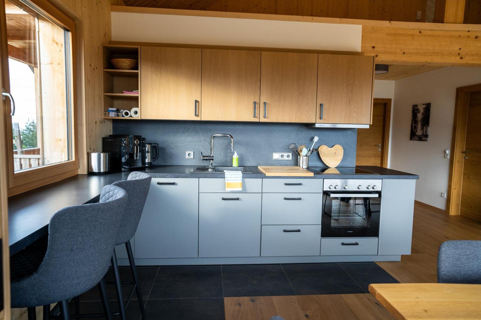 Holzhaus "Zum Schwarz'N" Apartment Aurach am Hongar Екстериор снимка