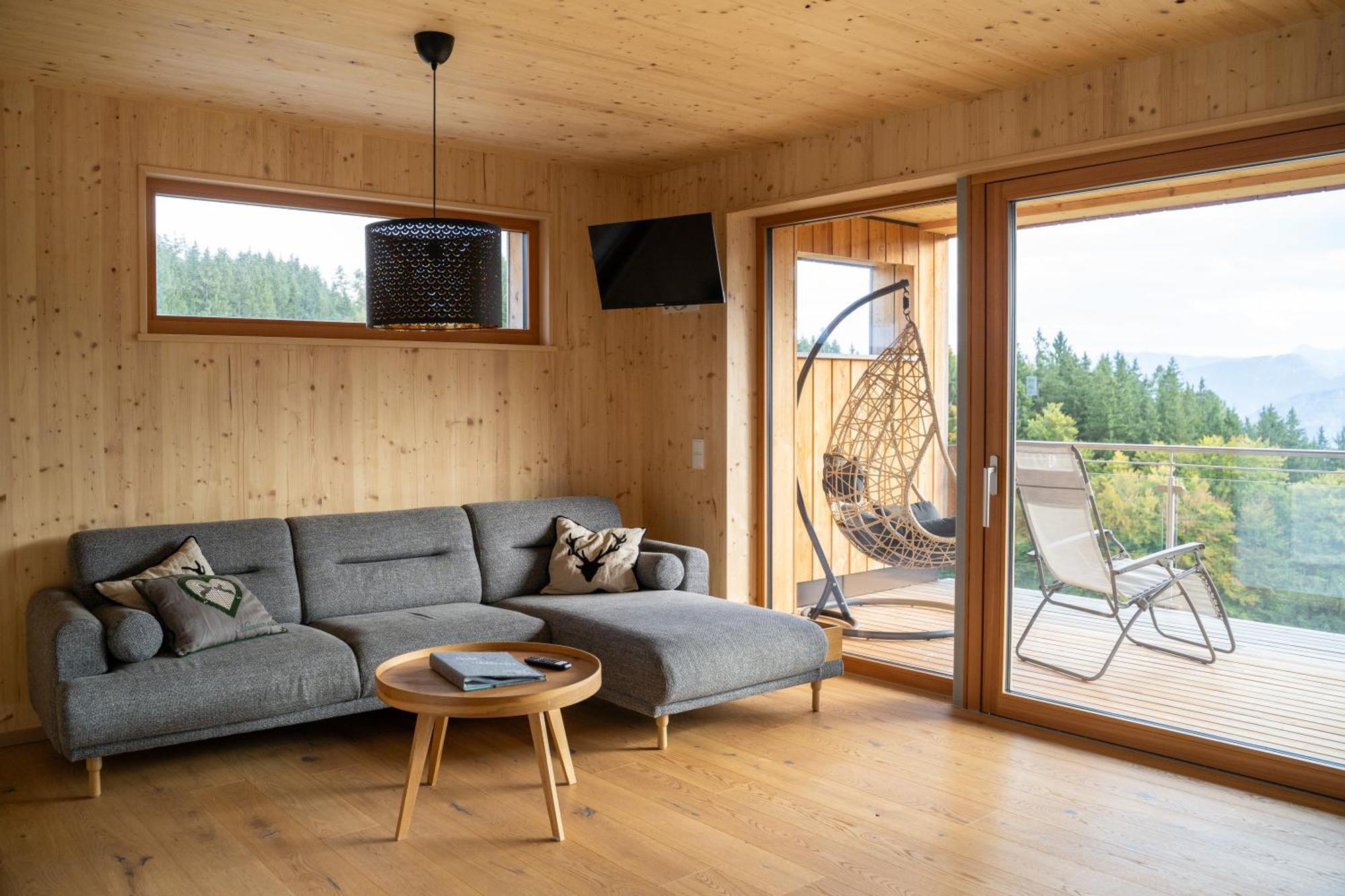Holzhaus "Zum Schwarz'N" Apartment Aurach am Hongar Екстериор снимка